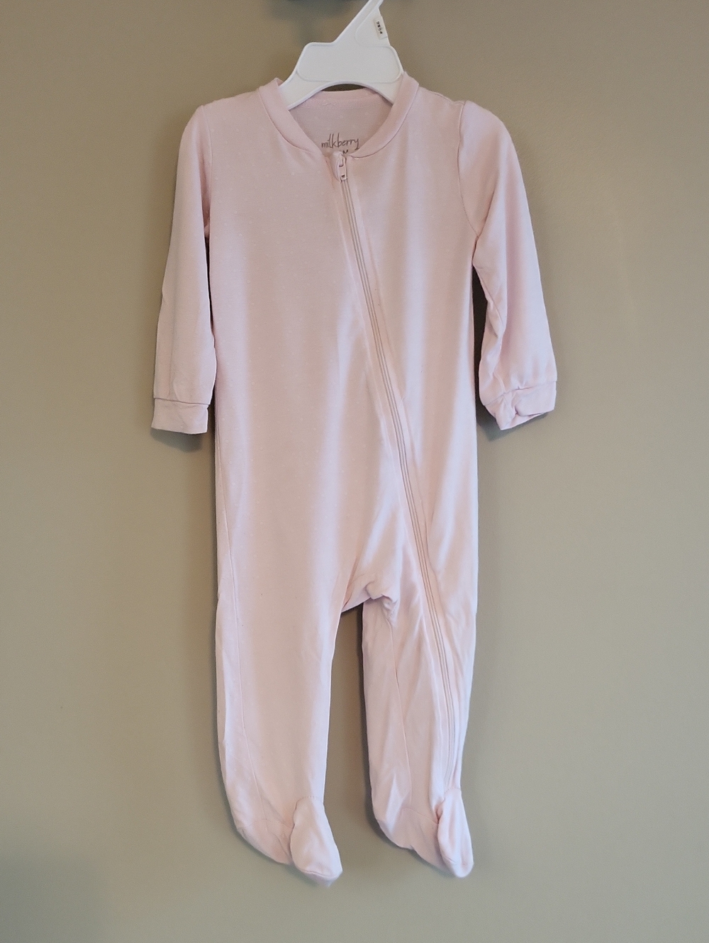 Milkberry light pink polka dot zip up footed sleeper/footie.